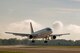 A Boeing 757 lands at Grissom Air Reserve Base, Ind., July 16, 2014.  The aircraft is the first to land on the newly renovated runway following a $3.2 million project that added expansion joints in the runway.  (U.S. Air Force photo/Staff Sgt. Ben Mota)