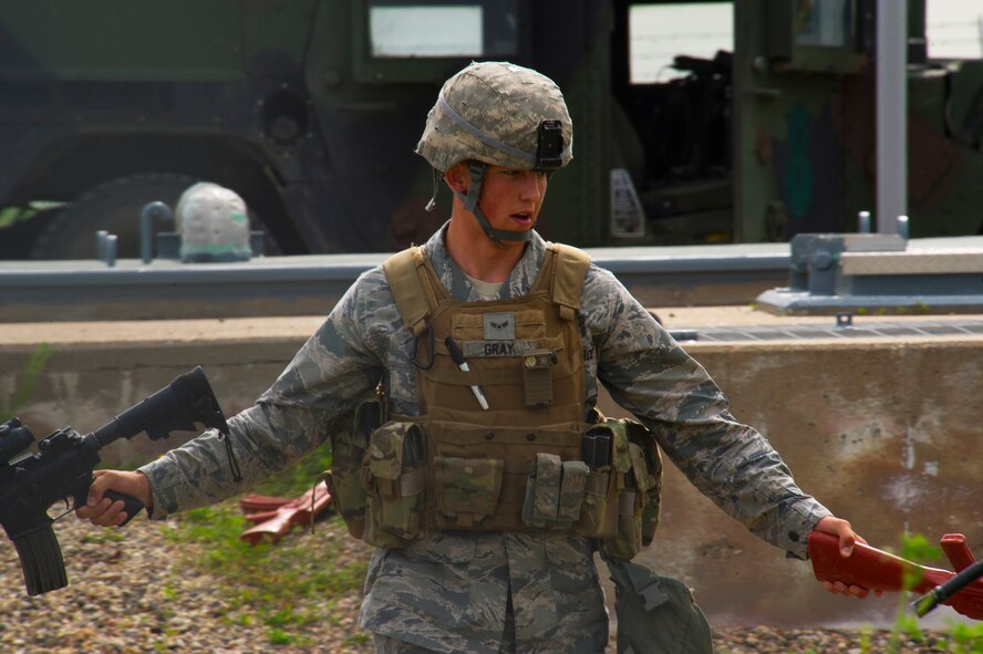 Airman 1st Class Marty Gray, 91st Missile Security Forces Squadron response force member, participates in a training exercise in North Dakota, July 11, 2014. The exercise simulated an opposing force taking over a launch facility and the defenders then recovering the asset. (U.S. Air Force photo/Senior Airman Brittany Y. Bateman)