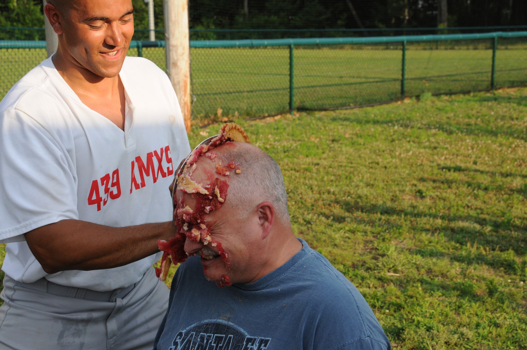CMSgt. Gary Hebert receives his pie! Chief Hebert won the honors by raising $96. The Company Grade Officer Council's Pie-in-the-Face contest raised more than $600 for the October ball to help pay for associated costs. (U.S. Air Force photo/TSgt. Brian Boynton)