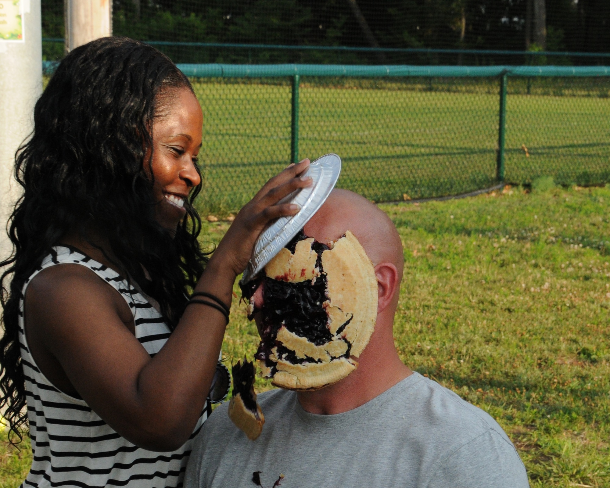 MSgt. Daniel Howard receives his pie! MSgt. Howard raised $82 among the first sergeants. The Company Grade Officer Council's Pie-in-the-Face contest raised more than $600 for the October ball to help pay for associated costs. (U.S. Air Force photo/TSgt. Brian Boynton)