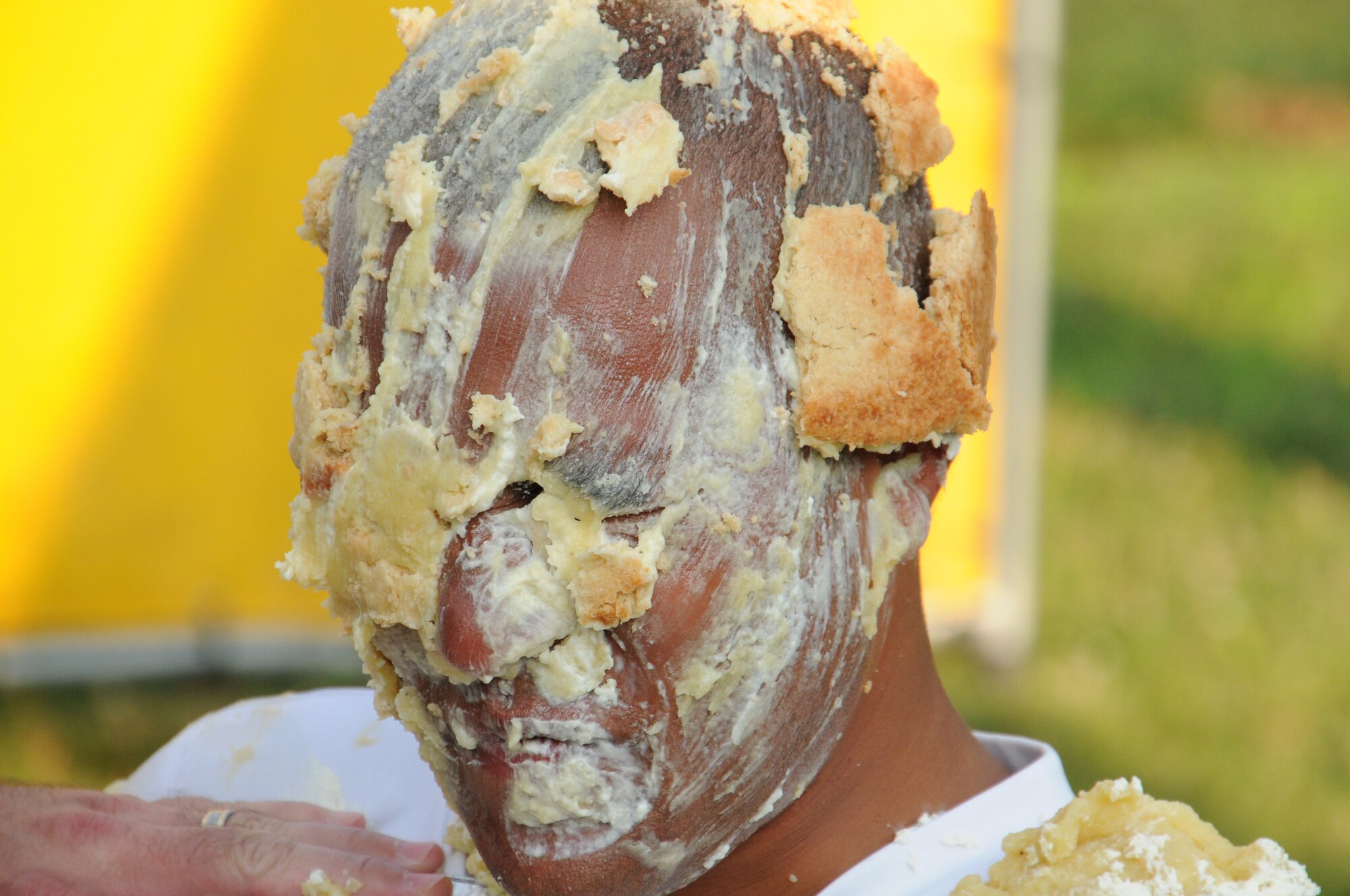 Honoree for the first bittersweet taste, TSgt. Christopher Eldridge,439th Aircraft Maintenance Squadron. The AMXS raised the most money, pulling in $180. The Company Grade Officer Council's Pie-in-the-Face contest raised more than $600 for the October ball to help pay for associated costs. (U.S. Air Force photo/TSgt. Brian Boynton)