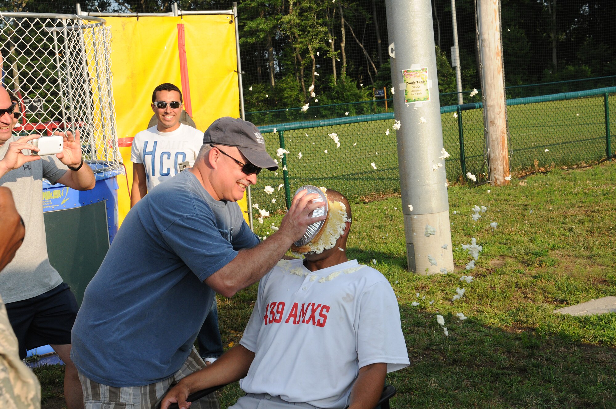 Honoree for the first bittersweet taste, TSgt. Christopher Eldridge,439th Aircraft Maintenance Squadron. The AMXS raised the most money, pulling in $180. The Company Grade Officer Council's Pie-in-the-Face contest raised more than $600 for the October ball to help pay for associated costs. (U.S. Air Force photo/TSgt. Brian Boynton)