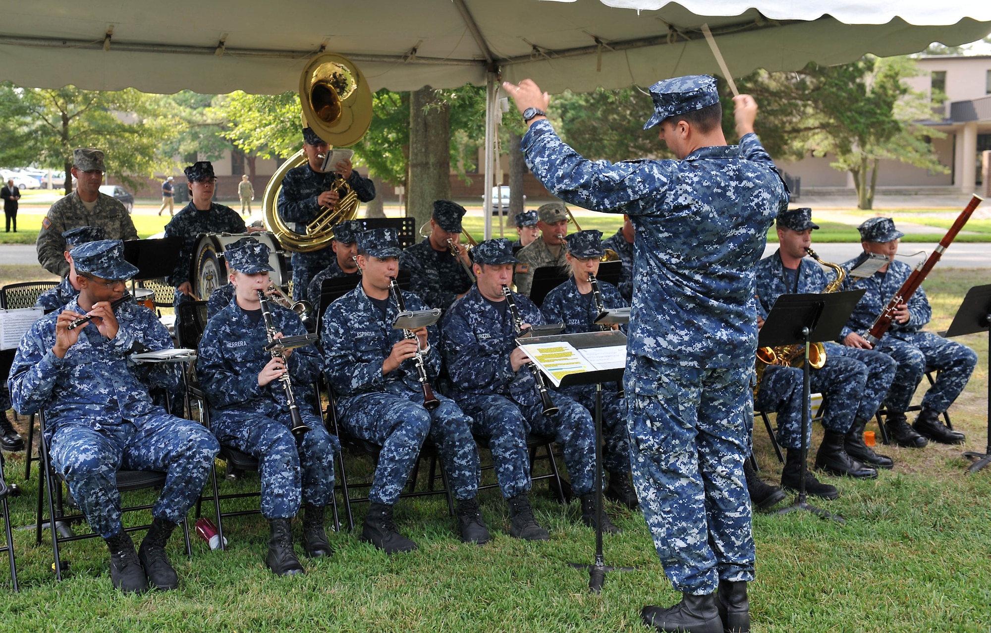 The U.S. Fleet Forces Band, based out of Norfolk, Va., plays the national anthem during the Joint Task Force Civil Support change of command ceremony at Fort Eustis, Va., July 15, 2014. During the ceremony, U.S. Army Maj. Gen. Jeff W. Mathis III relinquished command of JTF-CS to Maj. Gen. William F. Roy. (Official DOD photo by U.S. Navy Petty Officer 1st Class Brian Dietrick)