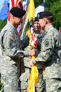 From left, U.S. Army Maj. Gen. William F. Roy accepts command of the Joint Task Force Civil Support from Gen. Charles H. Jacoby Jr., commander of the North American Aerospace Defense Command and U.S. Northern Command, during a ceremony at Fort Eustis, Va., July 15, 2014. Roy is the seventh commander in JTF-CS history. (U.S. Air Force photo by Airman 1st Class Kimberly Nagle/Released)