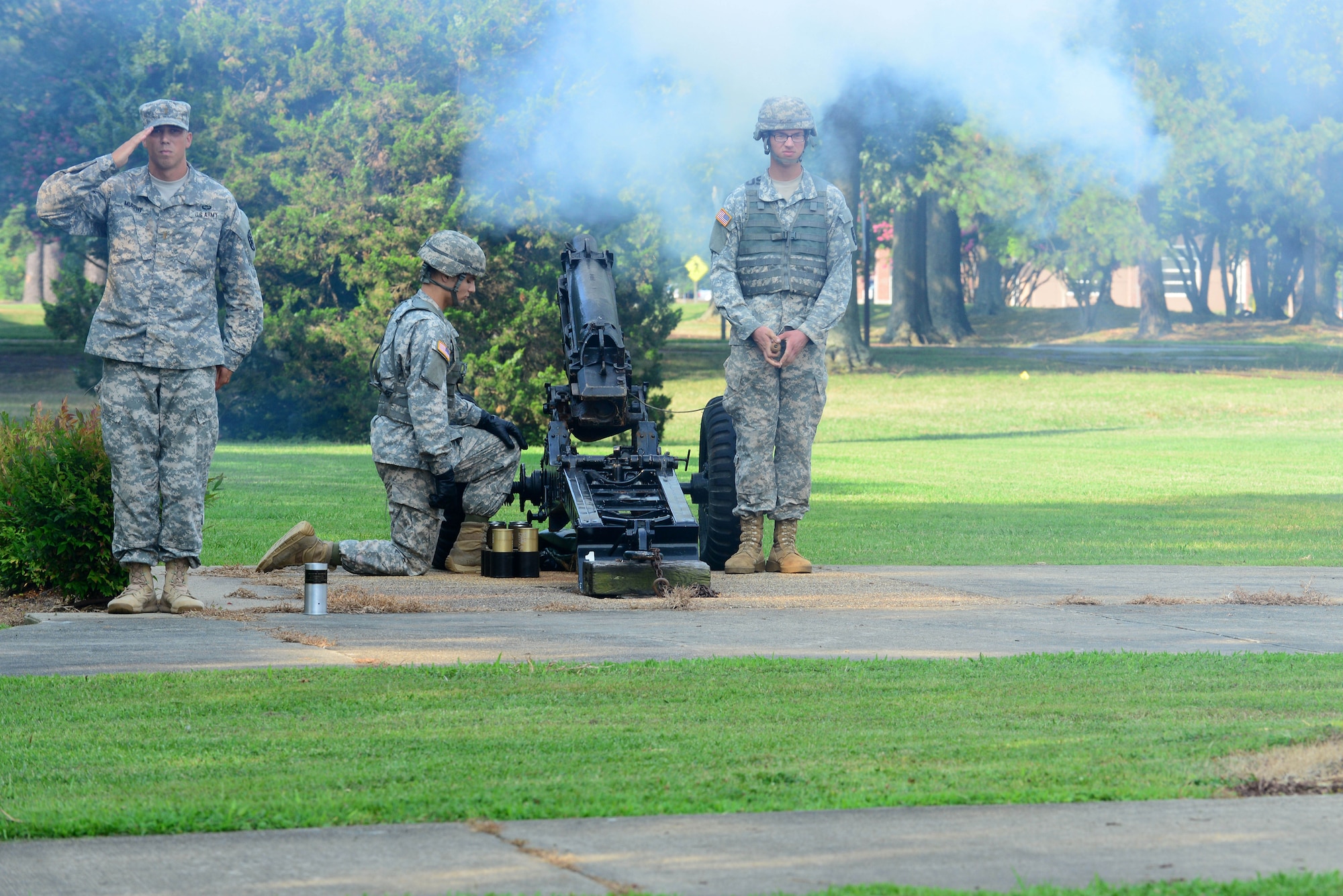 U.S. Army Soldiers perform a 13-gun salute, which is reserved for major generals as a display of respect, during a change of command ceremony at Fort Eustis, Va., July 15, 2014. The salute honored U.S. Army Maj. Gen. Jeff W. Mathis III, former Joint Task Force Civil Support commander, who relinquished command to Maj. Gen. William F. Roy. (U.S. Air Force photo by Airman 1st Class Kimberly Nagle/Released)