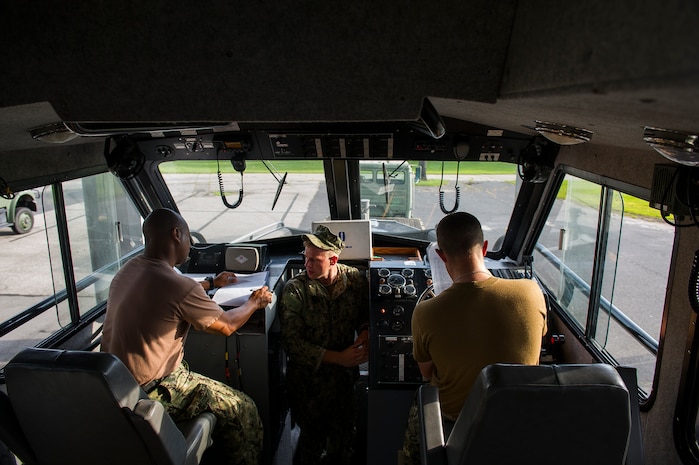 Members of Coastal Riverine Squadron 10, a U.S. Navy Reserve unit home based at Joint Base Charleston, prepare their patrol boat for the day’s operations July 12, 2014, at JB Charleston, S.C. CRS 10 is part of the Coastal Riverine Force which is comprised of three active-duty squadrons and four Reserve Squadrons. The units operate in harbors, rivers, bays, across the littorals and ashore. Their primary mission is to conduct maritime security operations across all phases of military operations by defending high value assets, critical maritime infrastructure, ports and harbors both inland and on coastal waterways against enemies, and when commanded, conduct offensive combat operations.  (U.S. Air Force photo/Senior Airman George Goslin)