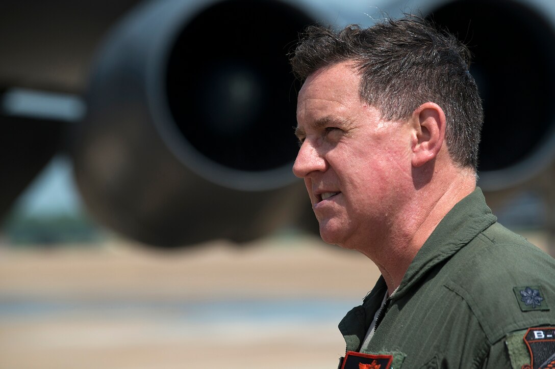 U.S. Air Force Lt. Col. Ronald Polomoscanik, 343rd Bomb Squadron navigator, returns from his last mission in a B-52H Stratofortress, July 12, 2014, Barksdale Air Force Base, La. Polomoscanik is retiring from the Air Force Reserve after 23 years of service, but is continuing in his avaition career as a Safety Inspector for the Federal Aviation Administration. (U.S. Air Force photo by Master Sgt. Greg Steele/Released)