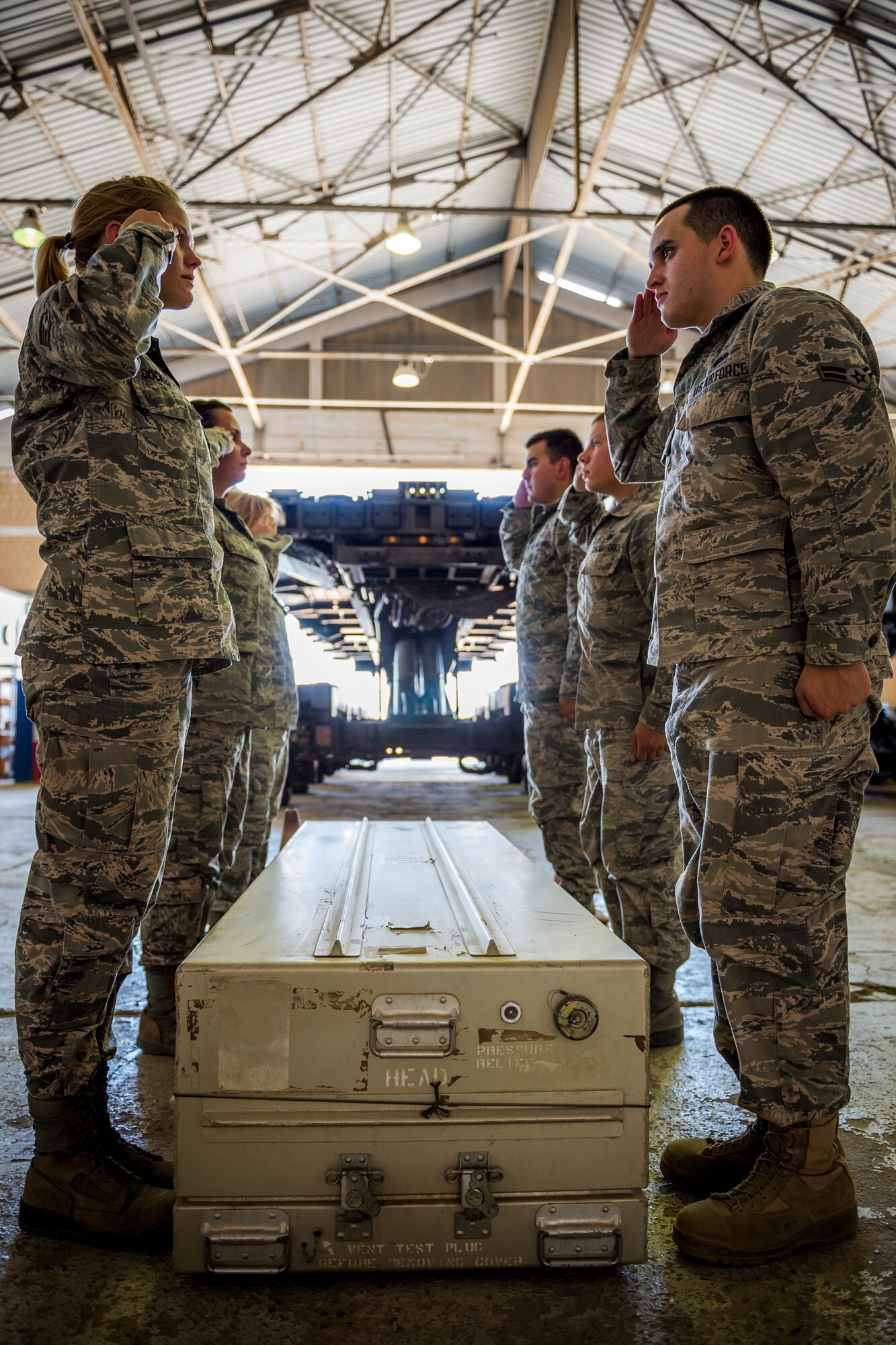 Airmen from the 387th Expeditionary Support Squadron practice for dignified transfers July 12, 2014 at an undisclosed location in Southwest Asia. These airmen train to handle those who have fallen in the line of duty with dignity and respect as they make their journey home to their families. These Airmen are available 24 hours, seven days a week for any dignified transfer.(U.S. Air Force photo by Staff Sgt. Jeremy Bowcock)