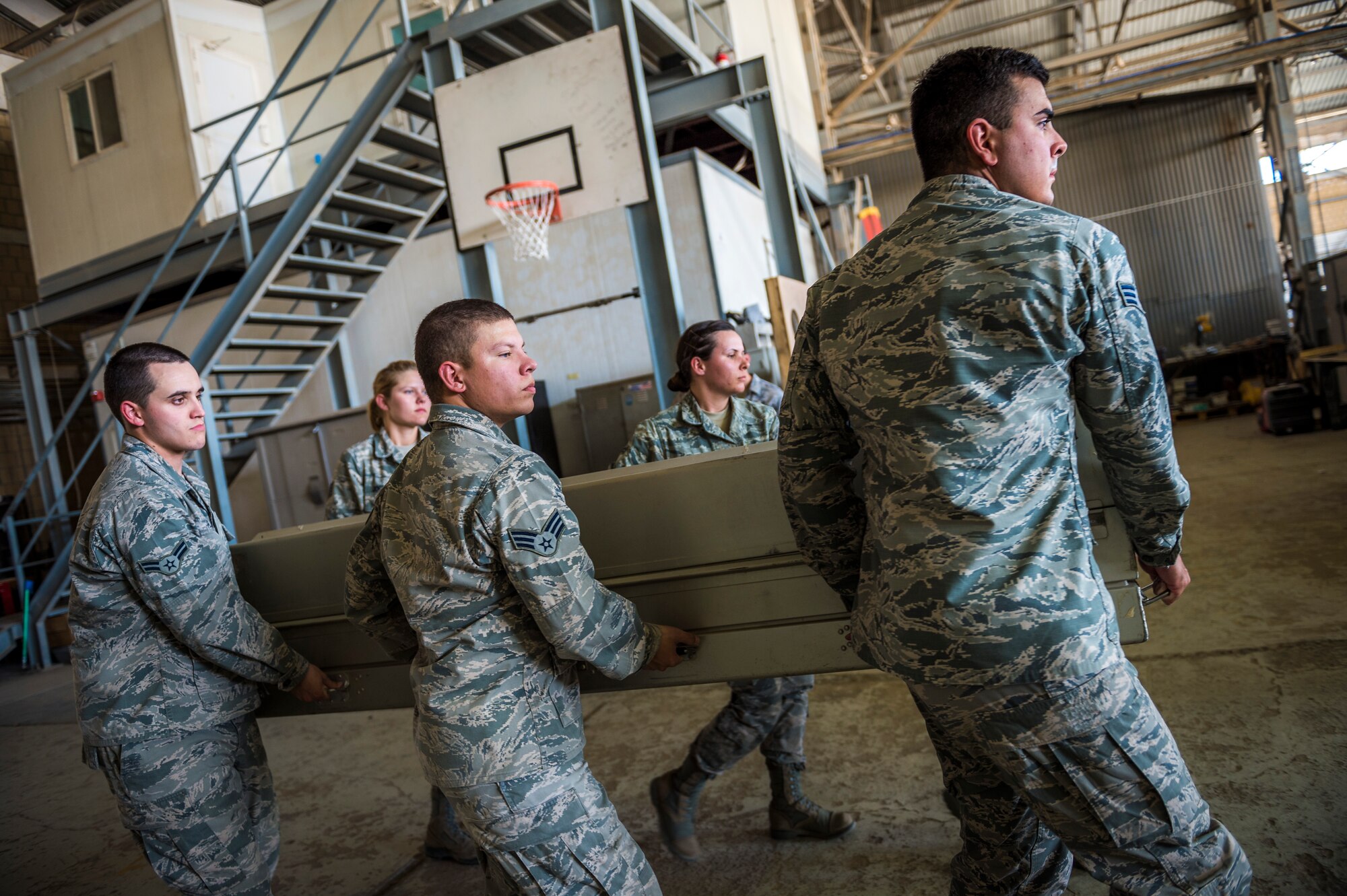 Airmen from the 387th Expeditionary Support Squadron practice for dignified transfers July 12, 2014 at an undisclosed location in Southwest Asia. These airmen train to handle those who have fallen in the line of duty with dignity and respect as they make their journey home to their families. These Airmen are available 24 hours, seven days a week for any dignified transfer. (U.S. Air Force photo by Staff Sgt. Jeremy Bowcock)