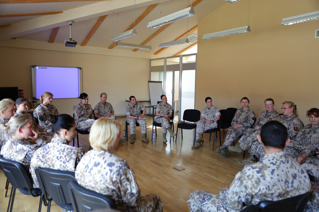 After U.S. Marines introduced Female Engagement Team concepts to Latvian Armed Forces servicemembers, a three-day bilateral training event in Adazi Military Base, Latvia, the participants give feedback on the course and discuss possible steps to furthering their FET training. This introduction was the first step for the Baltic partner to further evaluate the capability for use within their own military.