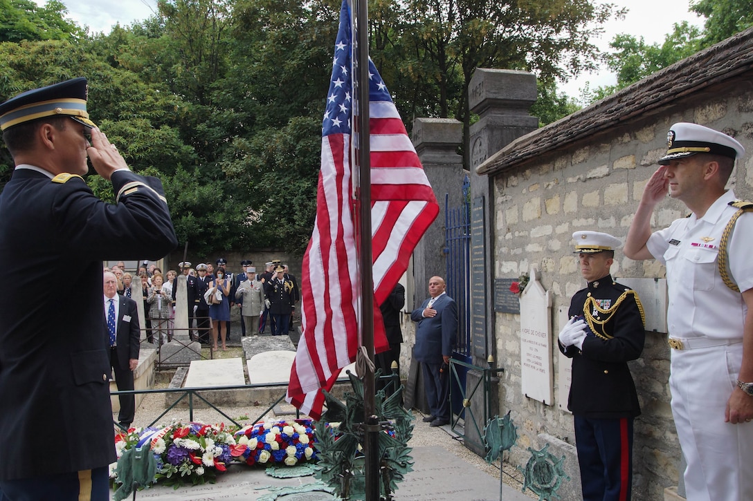 An American flag is lowered during an annual commemorative ceremony at the tomb of Maj. Gen. Marquis de Lafayette July 4. Each year, on America's Independence Day, French and American military personnel, dignitaries and societies place wreaths at the edge of Lafayette's tomb and lower the American flag, which is flown above the grave. The flag is then replaced, raised and flown until the ensuing year's ceremony. The memorial event, which began after World War I, honors Lafayette for his roles in both American and French conflicts such as the American War of Independence and the French Revolution. 