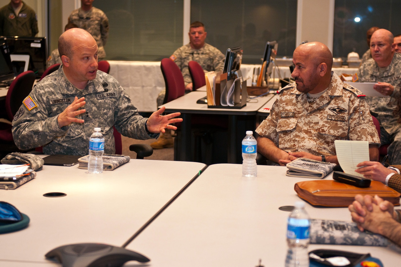 United Arab Emirates Staff Maj. Gen. Ali Al-Kaabi, senior military advisor to U.A.E. Crown Prince, speaks with Army Maj. Gen. Robert E. Livingston Jr., adjutant general of South Carolina, during his visit to South Carolina. Al-Kaabi saw Army and Air National Guard installations around Columbia, S.C., Feb. 3, 2012. Al-Kaabi traveled to South Carolina on behalf of the Crown Prince's interest in establishing a military force in U.A.E. similar to the National Guard