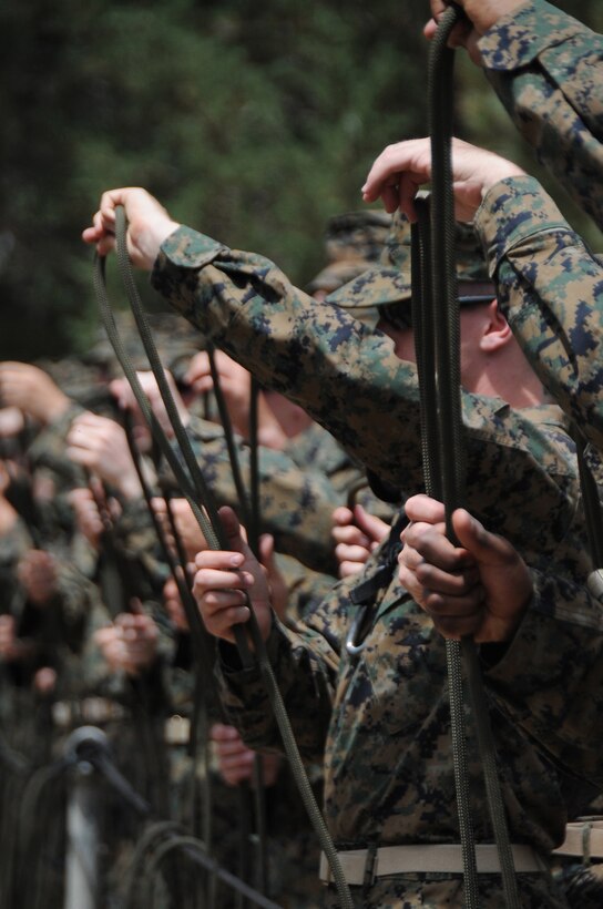 Naval Reserve Officer Training Corps Marine-option midshipmen learn knot-tying and rope skills at the Marine Corps Mountain Warfare Training Center Bridgeport, Calif. during midshipmen summer training, July 13. The midshipmen will use these skills for climbing, belaying, and river crossing during their training at MCMWTC. The 155 Naval Academy and NROTC midshipmen will spend 10 days at MCMWTC learning survival and tactical skills in a mountainous environment. (Official U.S. Navy photo by Lt. Matthew Comer)