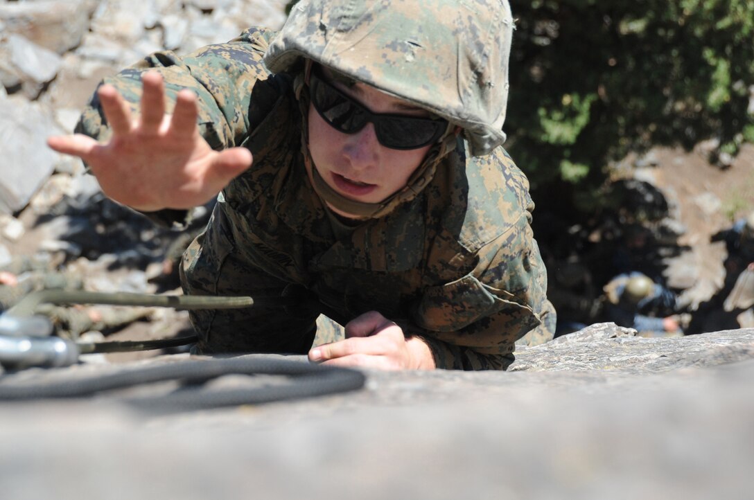 Midshipman 2nd Class Kyle Maurpin, Ohio State University Naval Reserve Officers Training Corps, climbs up a rock face at Marine Corps Mountain Warfare Training Center, Bridgeport, Calif. July 14.  Maurpin is one of 155 midshipmen training at MCMWTC.  The midshipmen spend 10 days at MCMWTC learning survival and tactical skills in a mountainous environment for summer training. (Official U.S. Navy photo by Lt. Matthew Comer)