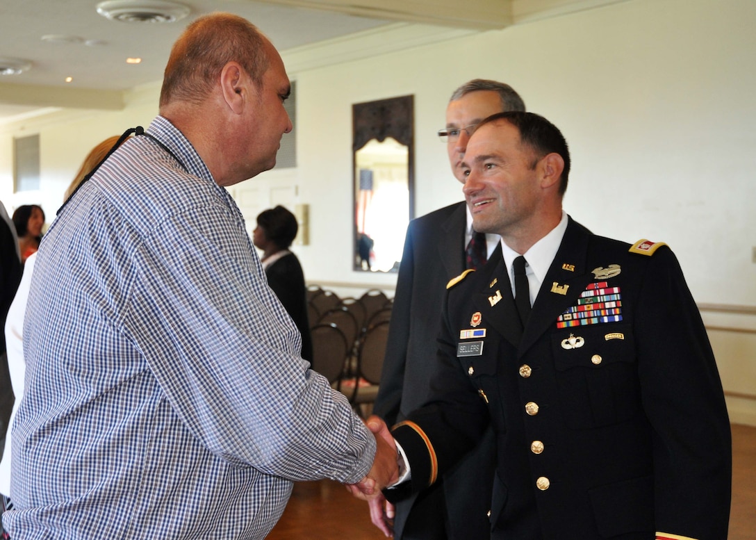 Dave Gerczak, outreach coordinator, took time to talk to Lt. Col. Michael L. Sellers the incoming commander for the Detroit District after the change of command ceremony July 10, 2014.