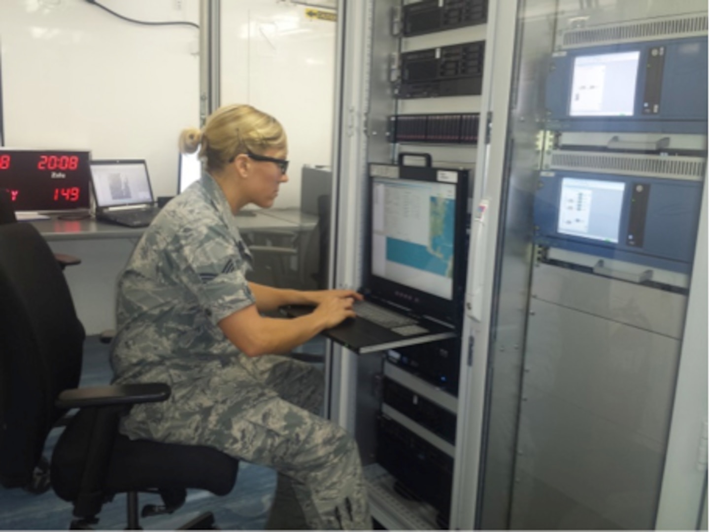 Staff Sgt. Kellie Hinkle, Eagle Vision-3, CANG, downloads commercial space-based products with newly fielded ground unit.
