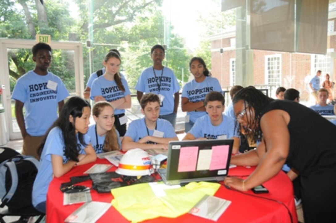 Civil Engineer Fontaine Jones, U.S. Army Corps of Engineers, Baltimore District, speaks to students regarding her career as an engineer with the Corps at the Career Connections Program on July 16.