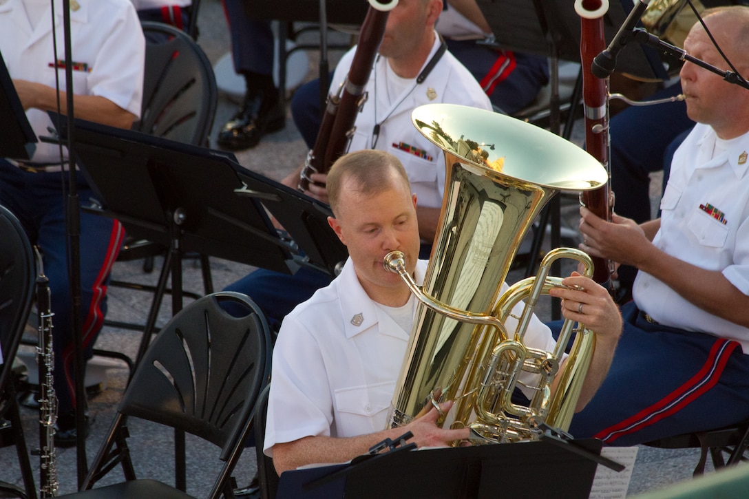 On July 16, 2014, at the U.S. Capitol in Washington, D.C., 1st Lt. Ryan J. Nowlin conducted his first concert as an assistant director. The program included marches by John Philip Sousa and Henry Fillmore, Gustav Holst's Suite in F for Military Band, and Carmen Dragon's arrangement of Samuel Augustus Ward's "America, the Beautiful." Pictured, Gunnery Sgt Franklin Crawford performing Jean Baptiste Arban's “Carnival of Venice.” (U.S. Marine Corps photo by GySgt Amanda Simmons/released)