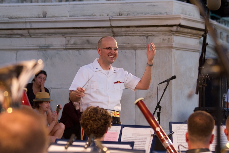 On July 16, 2014, at the U.S. Capitol in Washington, D.C., 1st Lt. Ryan J. Nowlin conducted his first concert as an assistant director. The program include marches by John Philip Sousa and Henry Fillmore, Gustav Holst's Suite in F for Military Band, and Carmen Dragon's arrangement of Samuel Augustus Ward's "America, the Beautiful." (U.S. Marine Corps photo by GySgt Amanda Simmons/released)
