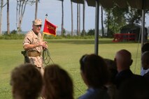 Brigadier Gen. Charles G. Chiarotti, the oncoming commanding general of 2nd Marine Logistics Group, speaks to guests during a change of command ceremony for 2nd MLG aboard Camp Lejeune, N.C., July 15, 2014. Chiarotti arrived at Camp Lejeune after serving as the deputy director of plans and programs for U.S. Africa Command in Stuttgart, Germany.
