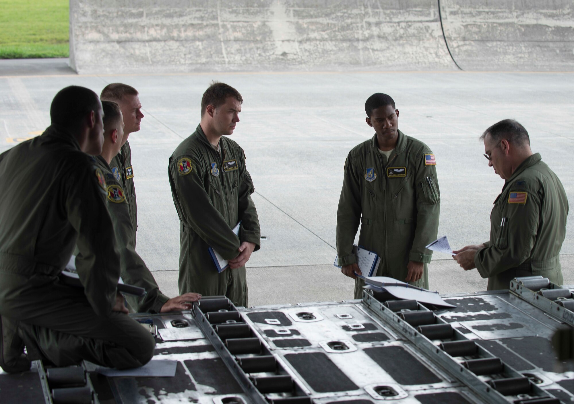 Col. Robert Blagg, commander of the 374th Operations Group, briefs his crew before a flight at Yokota Air Base, Japan, July 17, 2014. Each member of the crew has a pivotal role to ensure the flight is a success. (U.S. Air Force photo by Airman 1st Class Meagan Schutter/Released)