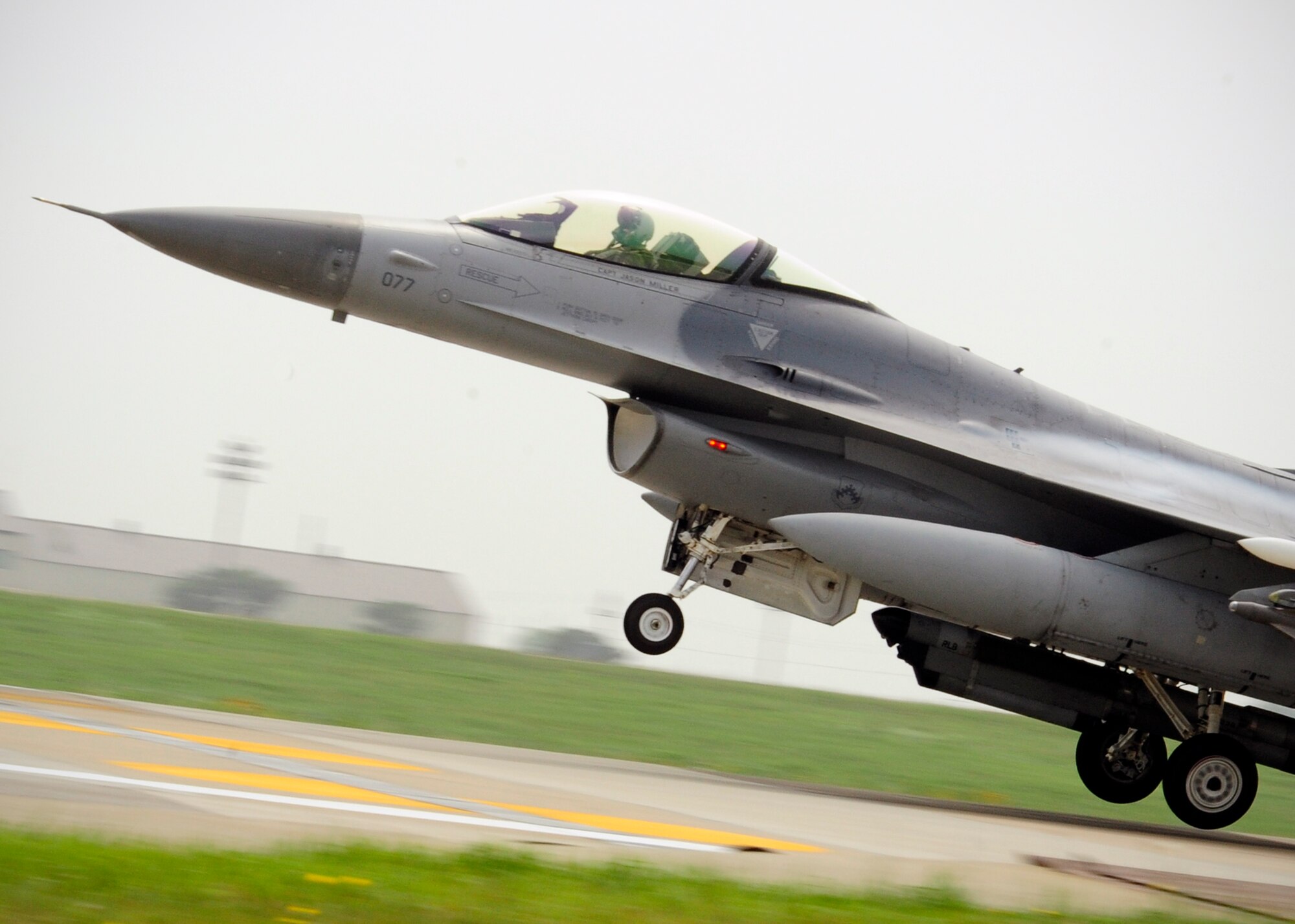 An F-16 Fighting Falcon takes off during exercise Beverly Midnight 14-2 at Kunsan Air Base, Republic of Korea, July 16, 2014. The Operational Readiness Exercise assesses mission capabilities and ensures the Wolf Pack is in a constant state of readiness. (U.S. Air Force photo by Senior Airman Taylor Curry/Released) 
