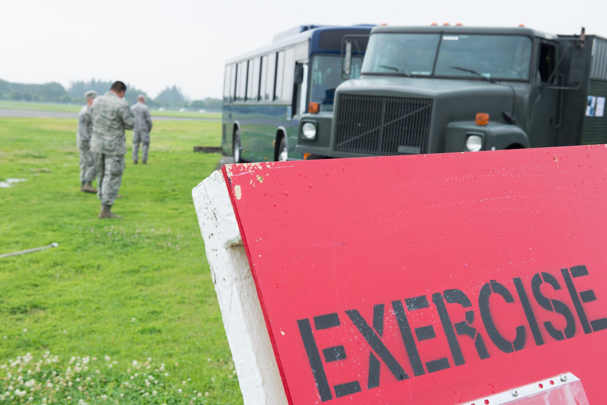Members of the 374th Airlift Wing Inspection Team prepare a simulated accident scene leading up to an Emergency Management Exercise at Yokota Air Base, Japan, July 17.  The EME was the culminating event for the Samurai Readiness Training Week during which 374th members focused on training for various emergency and contingency situations.  (U.S. Air Force photo by Tech. Sgt. Christopher Marasky)