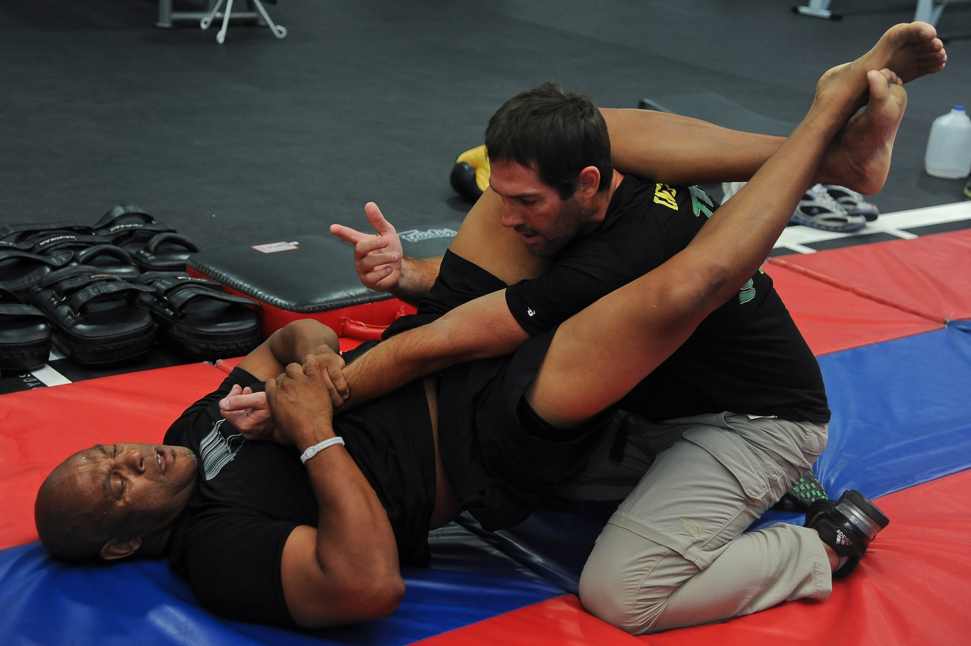 Team Ill Brasil brings a new style of martial arts to the base. The Luke Air Force Base Bryant Fitness Center now offers discipline specific martial arts training Monday through Friday at the Combat Training Center. (U.S. Air Force photo/Airman 1st Class Pedro Mota)