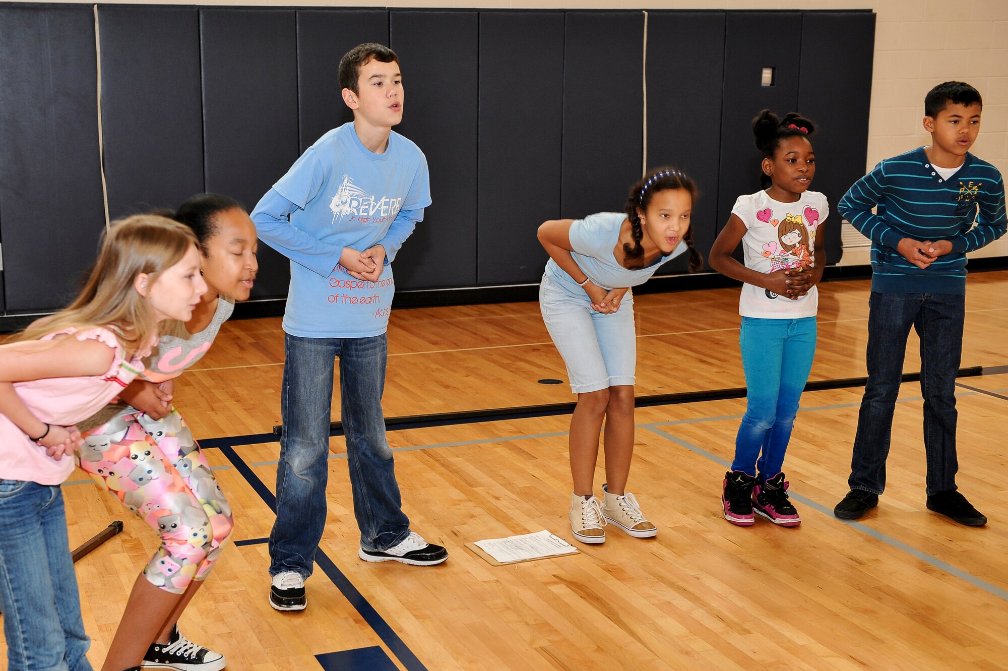 Blackbeard’s crew practice their song and dance routine during the Missoula Children’s Theater production of Blackbeard the Pirate June 16, 2014, at the youth center on Buckley Air Force Base, Colo. More than 40 Buckley children participated in the production. (U.S. Air Force photo by Senior Airman Phillip Houk/Released)