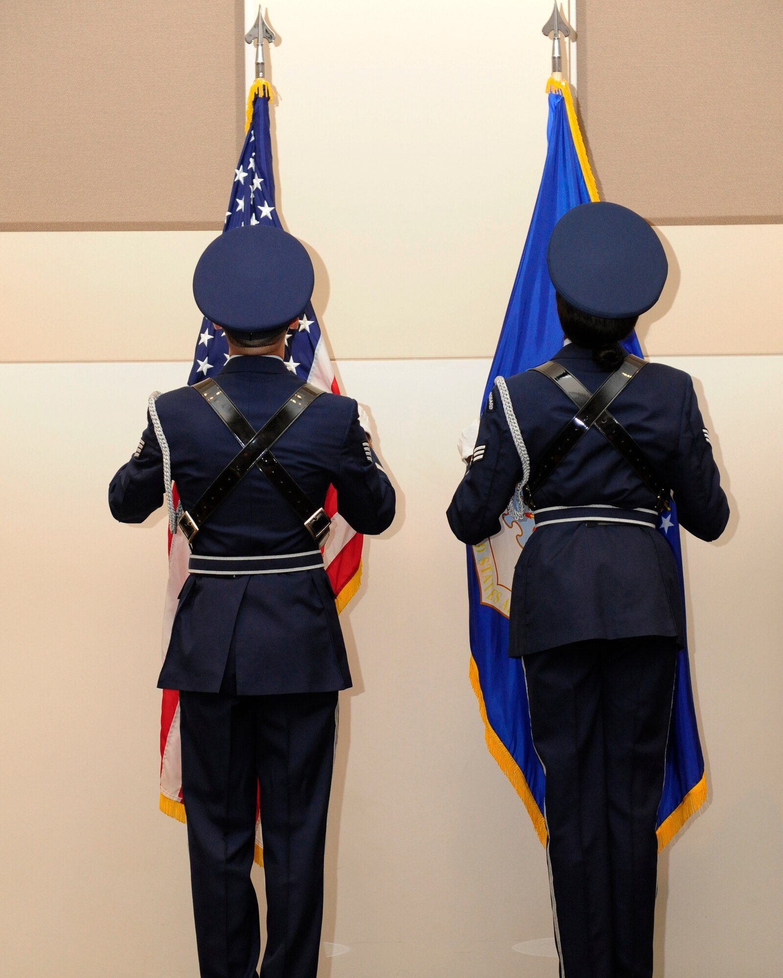 The Mile High Honor Guard presents the colors during the 460th Space Communications Squadron Change of Command ceremony July 17, 2014, at the Leadership Development Center on Buckley Air Force Base, Colo. The event signaled Maj. Christopher Kennedy, 460th SCS commander, assuming command from Lt. Col. Hew Wells. (U.S. Air Force photo by Airman 1st Class Samantha Saulsbury/Released)