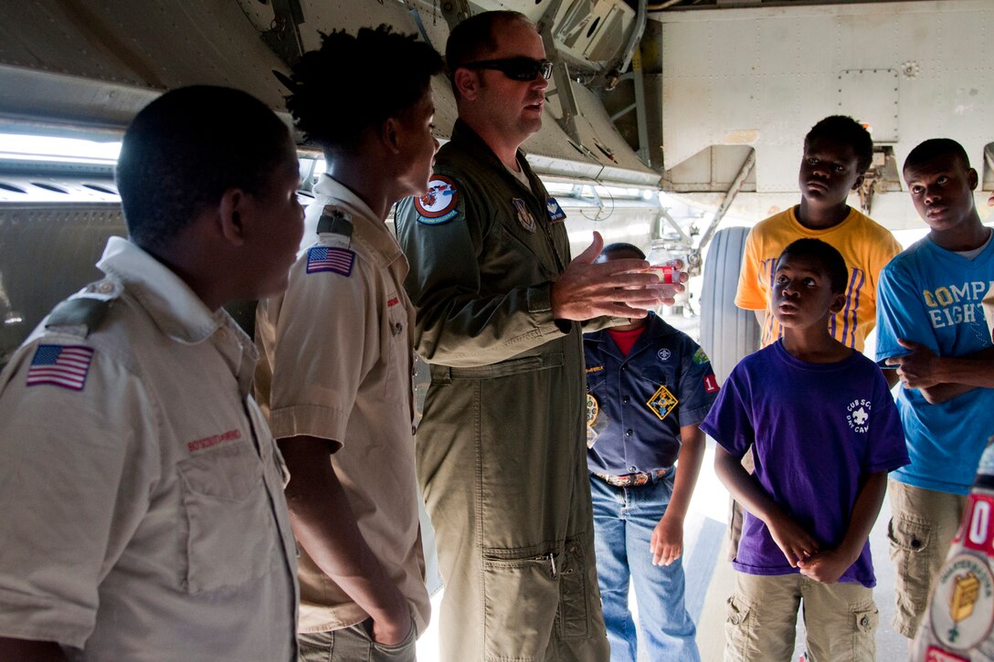 U.S. Air Force Capt. Andrew Baird, a 93rd Bomb Squadron pilot, shows a group of Boy Scouts the bomb bay of a B-52 Stratofortress during a tour on July 12, 2014, Barksdale Air Force Base, La. The scouts are from Stonewall Baptist Church, Boy Scout Troop 103, in Bossier City, La. (U.S. Air Force photo by 2nd Lt Monique Roux) 