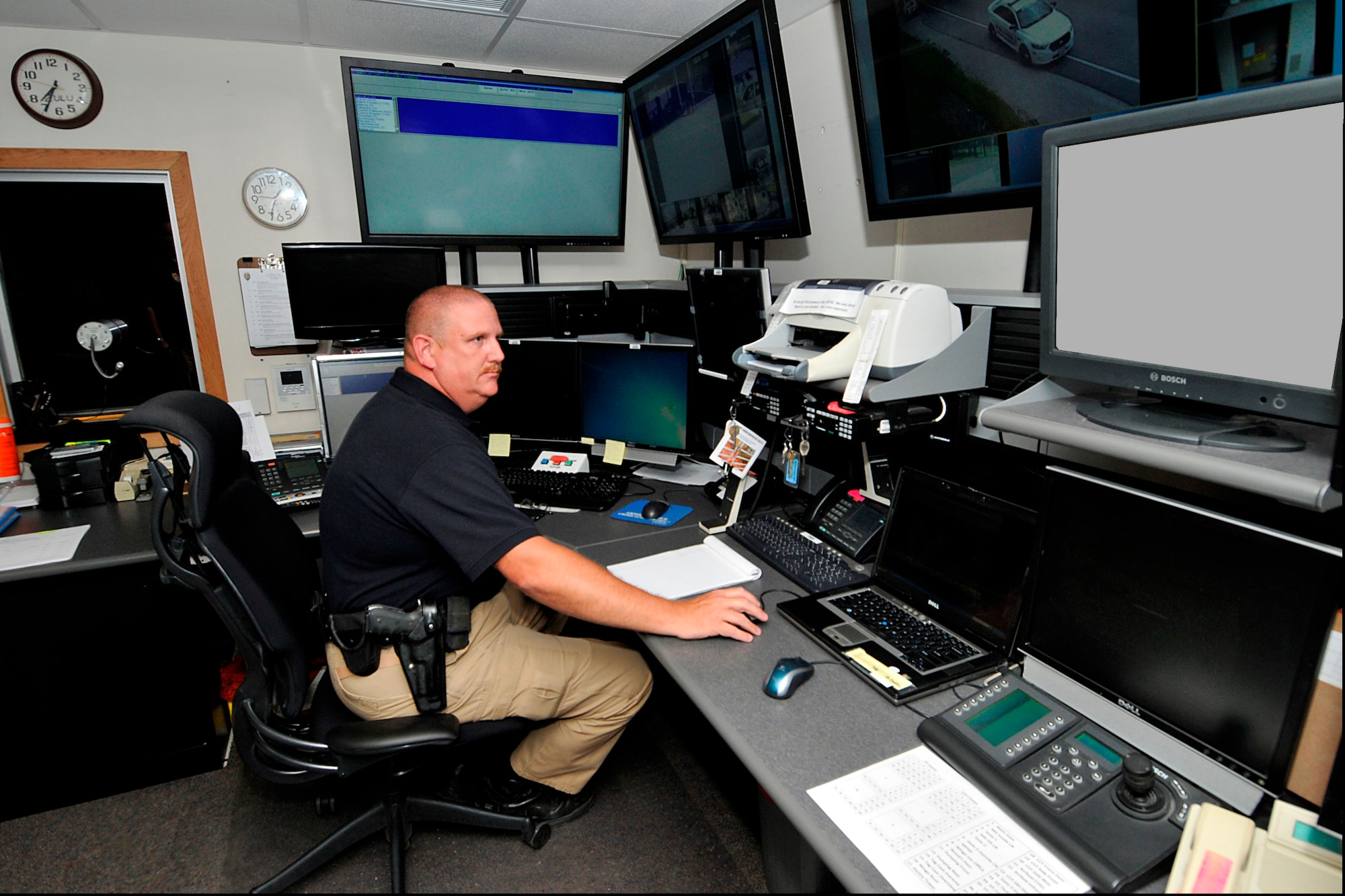 Sgt. Trey Glenn monitors the base from Arnold Engineering Development Complex’s Base Defense Operations Center (BDOC) using new equipment recently installed as part of the conversion to a new standardized security system. (Photo by Rick Goodfriend)