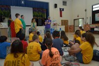 U.S. Air Force Technical Sgt. Kevin Dilley, 502nd Air Base Wing, Chapel and VBS middle school teacher, speaks to middle schoolers students during vacation bible school June 26 at Joint Base San Antonio-Randolph. (U.S. Air Force photo by Joel Martinez/Released)