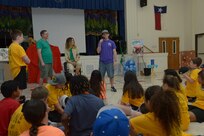 U.S. Air Force Technical Sgt. Kevin Dilley, 502nd Air Base Wing, Chapel and middle school teacher, speaks to middle schoolers students during vacation bible school June 26 at Joint Base San Antonio-Randolph. (U.S. Air Force photo by Joel Martinez/Released)