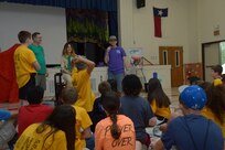U.S. Air Force Technical Sgt. Kevin Dilley, 502nd Air Base Wing, Chapel and middle school teacher, speaks to middle schoolers students during the vacation bible school June 26 at Joint Base San Antonio-Randolph. (U.S. Air Force photo by Joel Martinez/Released)
