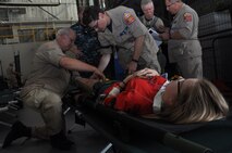 National Medical Assistance Team PA-1 members assesses a simulated victim during Lycoming Reach at the Pittsburgh International Air Reserve Station, July 12, 2014. (U.S. Air Force photo by Senior Airman Justyne Obeldobel)