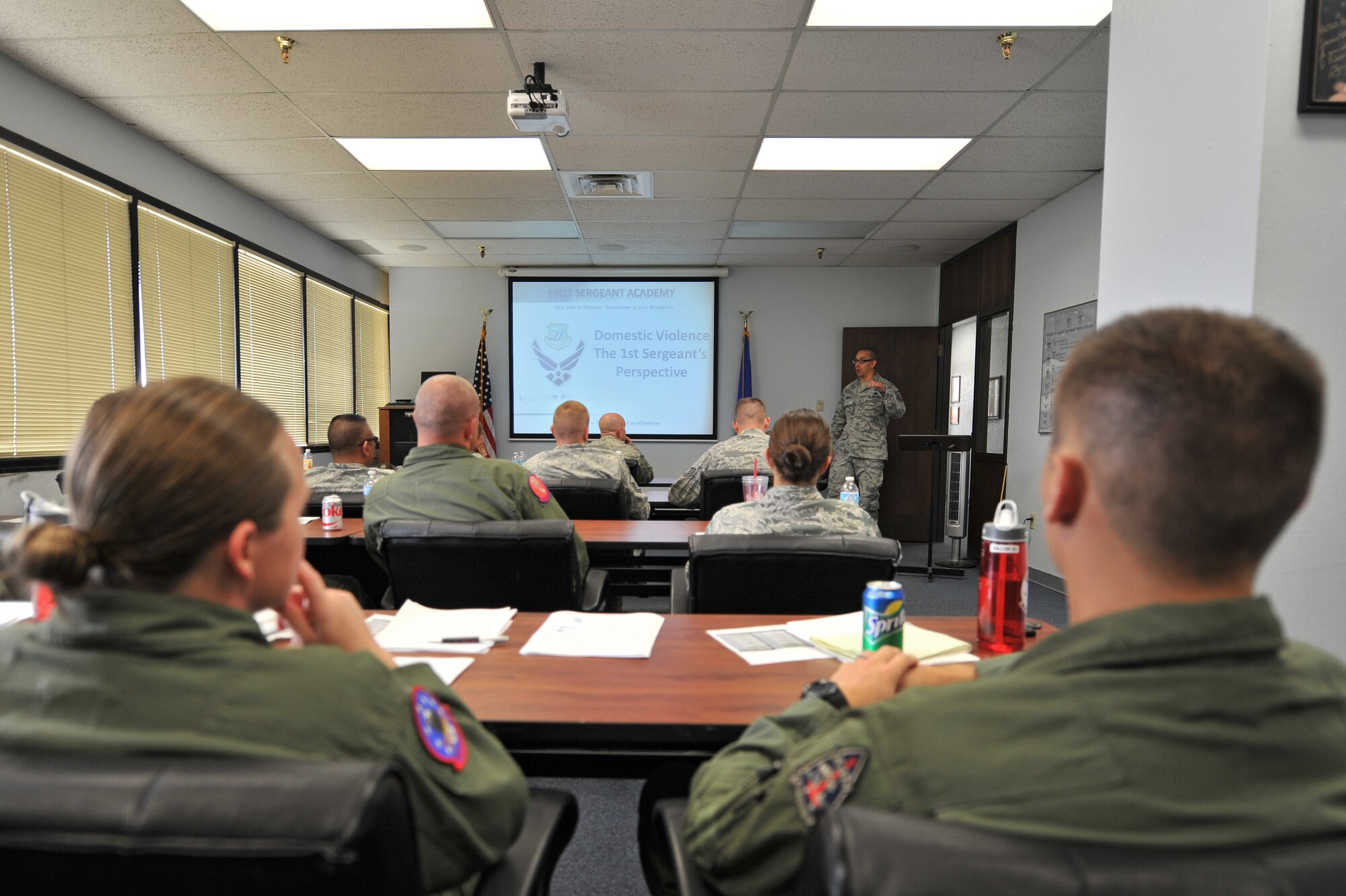 ALTUS AIR FORCE BASE, Okla. – U.S. Air Force Master Sgt. Jason Greco, 97th Civil Engineer Squadron first sergeant, speaks to NCOs during the Altus AFB First Sergeant Symposium July 15, 2014. Greco spoke to the class about how to properly handle domestic disputes among Airmen as a preparation for upcoming roles and responsibilities as acting first sergeants. (U.S. Air Force photo by Senior Airman Dillon Davis/Released)