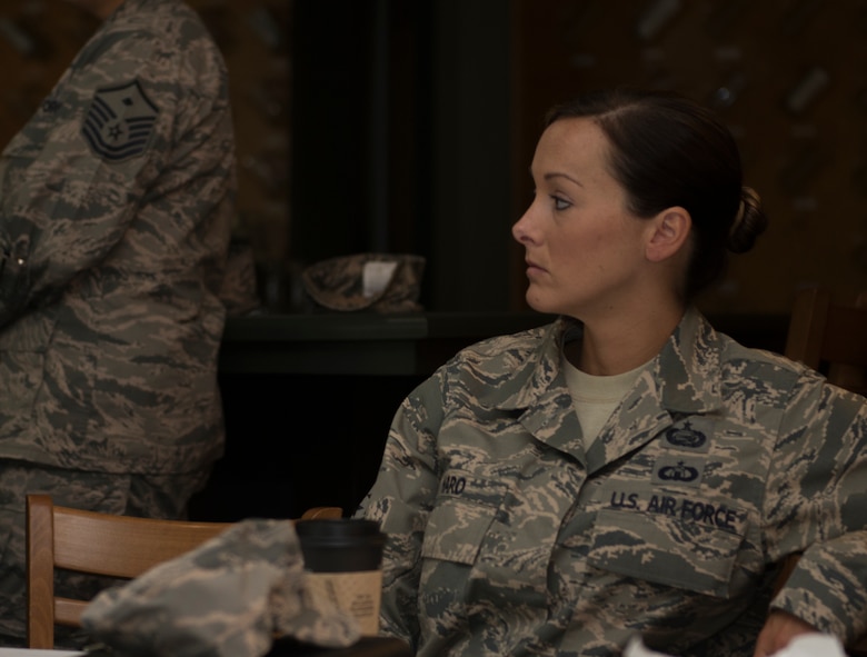 U.S. Air Force Master Sgt. Jacqueline Haro, 23d Maintenance Operations Flight first sergeant, listens during a breakfast with Moody’s first sergeants July 16, 2014, at Moody Air Force Base, Ga. Col. Chad Franks, 23d Wing commander, hosted the breakfast with the first sergeants to receive suggestions on how to improve the base. (U.S. Air Force photo by Airman Dillian Bamman/Released)
