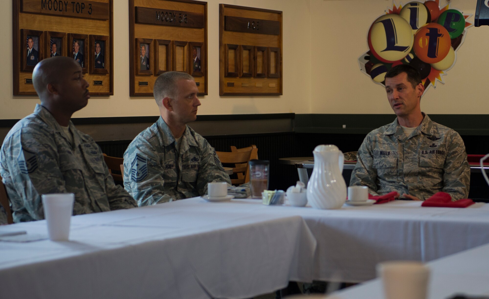U.S. Air Force Chief Master Sgt. Matthew Wells, right, 23d Wing command chief, attends a breakfast with Moody’s first sergeants July 16, 2014, at Moody Air Force Base, Ga. The first sergeants gave an early farewell to Wells, who will soon take over as the 20th Air Force command chief out of F.E. Warren Air Force Base, Wyo. (U.S. Air Force photo by Airman Dillian Bamman/Released)