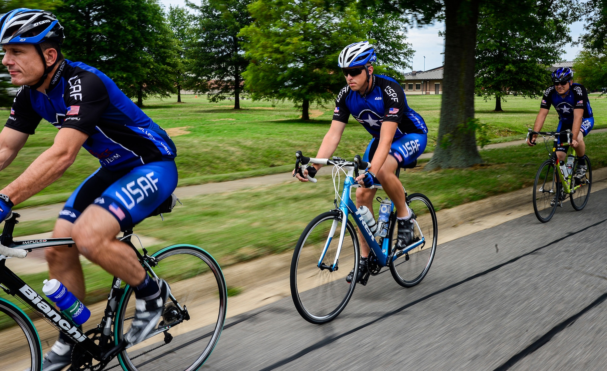 From left, U.S. Air Force Col. Thaddeus Chamberlain, Staff Sgt. Aaron Kirby and Airman 1st Class Shane Jochum, Air Force Cycling Team members, train for an upcoming event at Langley Air Force Base, Va., July 16, 2014. The Air Force Cycling Team will participate in The Register’s Annual Great Bicycle Ride Across Iowa, a week-long ride totaling close to 500 miles. (U.S. Air Force photo by Senior Airman Kayla Newman/Released) 
