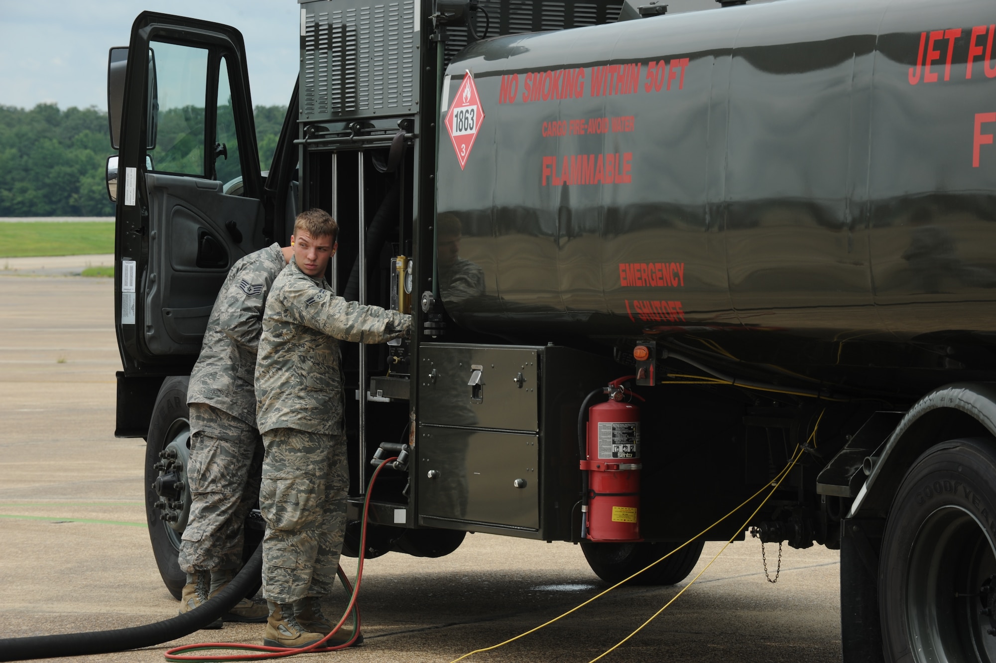 Airman 1st Class Brandon Jenkins, a 19th Logistics Readiness Squadron fuels management flight fuels distribution operator, prepares to disperse fuel July 10, 2014, at Little Rock Air Force Base, Ark. Fuels distribution operators drive servicing units out to the aircraft and either issue or defuel Jet A depending on the mission requirements. (U.S. Air Force photo by Airman 1st Class Scott Poe)