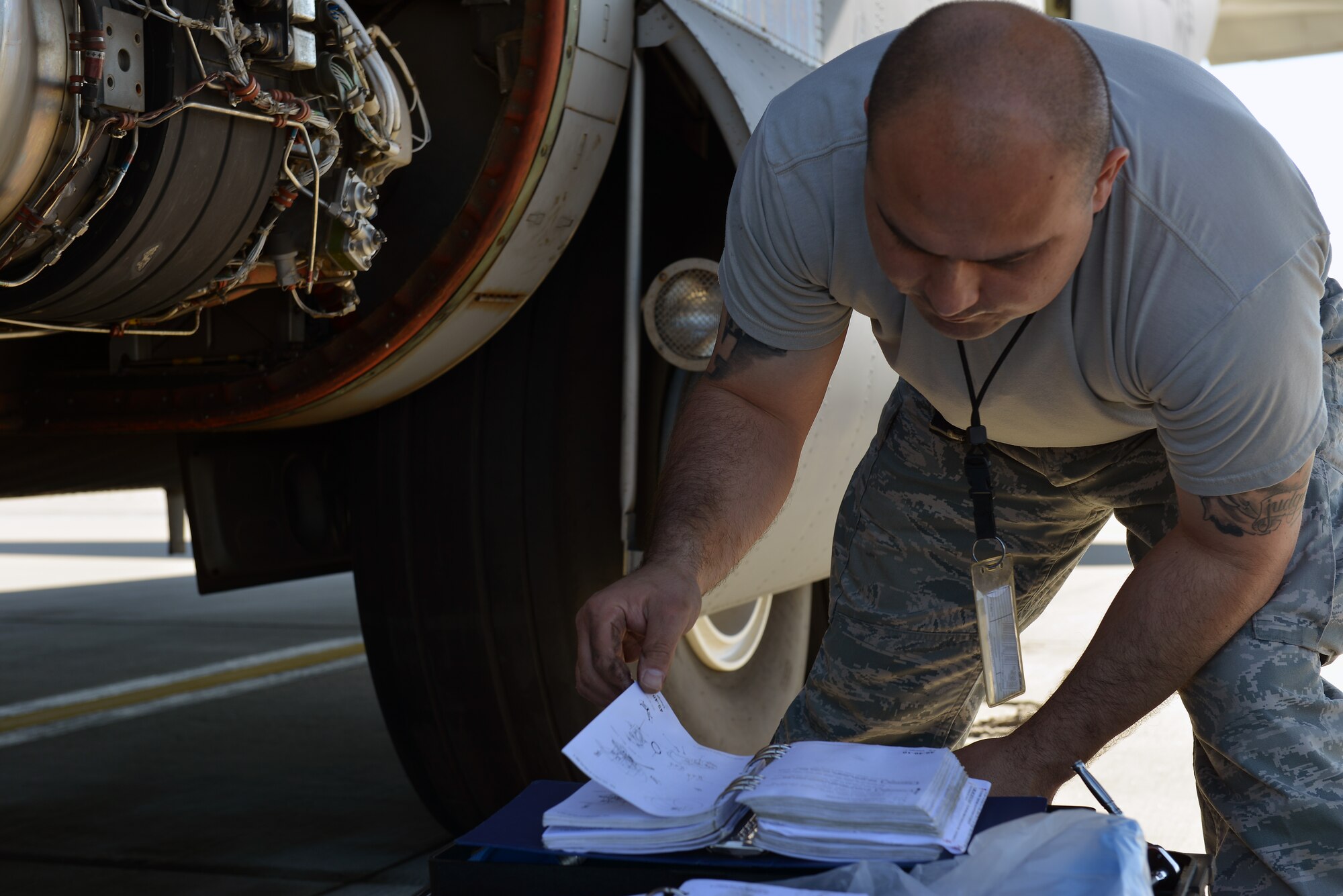 Tech. Sgt. Edwin Huertas, 86th Aircraft Maintenance Squadron propulsion engineer NCOIC, checks his tools before fixing a part on a C-130J Super Hercules, June 7, 2014, on Ramstein Air Base, Germany. Members of the 86th AMXS work round the clock to ensure aircraft are mission ready at all times.(U.S. Air Force photo by/Senior Airman Holly Mansfield)