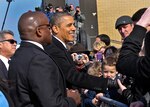 President Barack Obama greets the public during his visit to Milwaukee, Feb. 15, 2012. The president arrived and departed at the Wisconsin Air National Guard's 128th Air Refueling Wing.