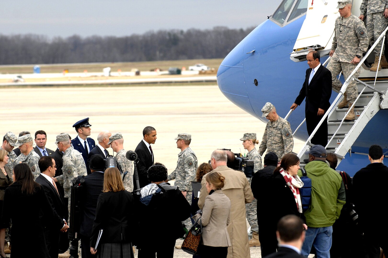 President Barack Obama greets troops from U.S. Forces Iraq as they arrive home from Iraq on Joint Base Andrews, Md., Dec. 20, 2011.