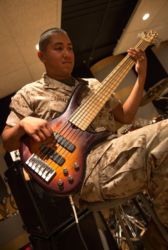 Lance Cpl. Eric Toralba, a bassist with the 3rd Marine Aircraft Wing Band, plays bass during rehearsal aboard Marine Corps Air Station Miramar, Calif., July 16. Toralba and his fellow musicians prepare for the band’s participation in Marine Week Seattle, scheduled for July 26 - Aug. 3, while continuing to perform at ceremonies and events throughout the West Coast.