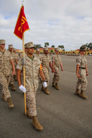 Lance Cpl. Calvin J. Gutierrez, Platoon 2101, Echo Company, 2nd Recruit Training Battalion, leads platoon 2101 during graduation practice at Marine Corps Recruit Depot San Diego, Calif., July 15. Gutierrez is a El Monte, Calif., native and was recruited out of Recruiting Substation Montebello, Calif.
