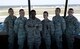 A group of 1st Special Operations Support Squadron air traffic controllers pose for a group photo inside the base tower on Hurlburt Field, Fla., July 17, 2014. At any given time the tower may be maintained by 3 or 4 personnel, depending on the amount air traffic. (U.S. Air Force photo/Senior Airman Kentavist P. Brackin)