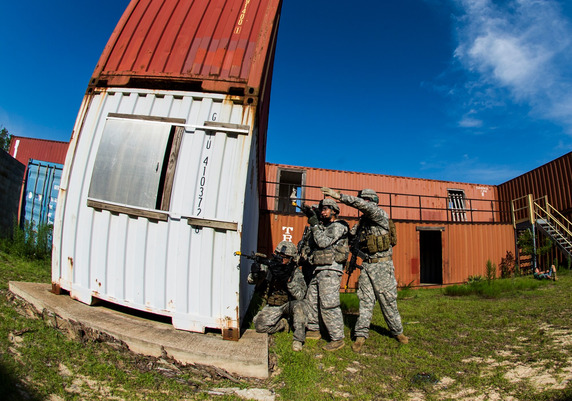 Soldiers from the 82nd Airborne Division plan their next move during a training exercise on Eglin Range, Fla., July 17, 2014. The 1st Special Operations Support Squadron HAVE-ACE hosted a joint training exercise to continue building trusted relationships with our joint combat teammates. (U.S. Air Force photo/Senior Airman Christopher Callaway)