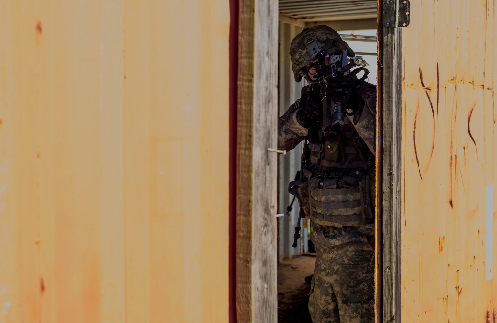 A Soldier from the 82nd Airborne Division posts security during an infil and exfil training exercise on Eglin Range, Fla., July 17, 2014. The 1st Special Operations Support Squadron HAVE-ACE helped host a joint training exercise to continue building trusted relationships with our joint combat teammates. (U.S. Air Force photo/Senior Airman Christopher Callaway) 