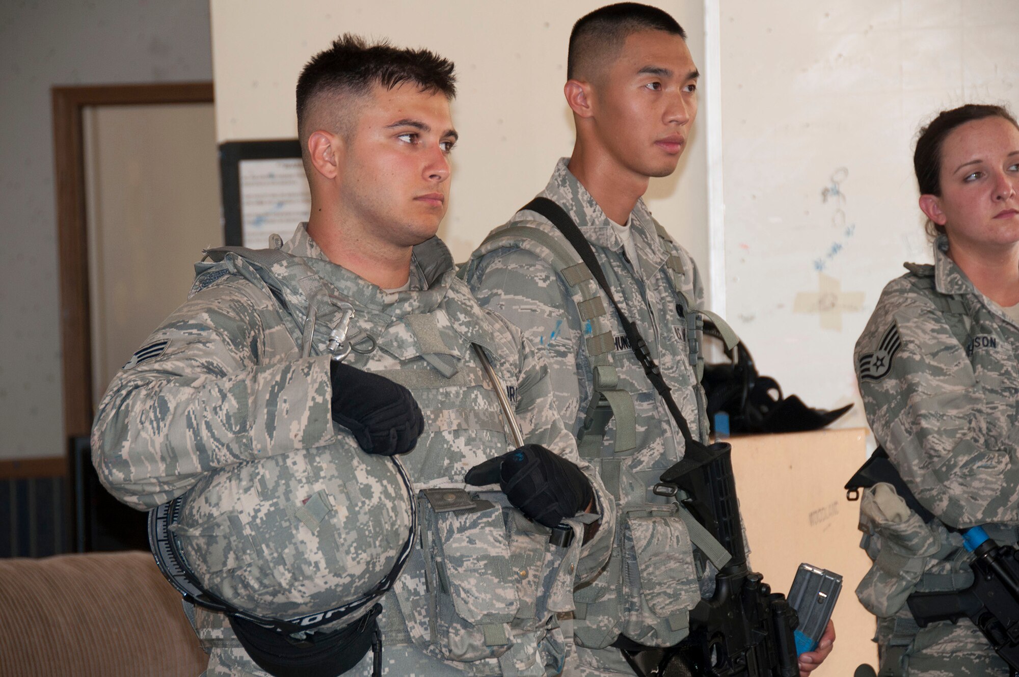 TRAVIS AIR FORCE BASE, Calif. -- Members of the 349th Security Forces Squadron participate in an active shooter exercise at Travis Air Force Base, Calif., July 13, 2014. (U.S. Air Force photo / Staff Sgt. Amelia Leonard)
